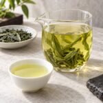 Brewed First Grade Lu'an Guapian Tea with clear liquor
