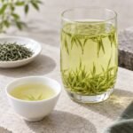 Brewed First Grade Xinyang Maojian Tea with clear liquor