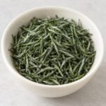 Mingqian Xinyang Maojian Tea dry leaves